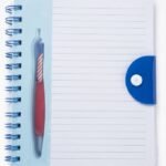 Spiral Lined Notebook with Pen Graphic & Button Closure